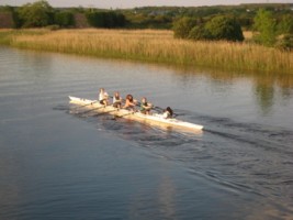Young people rowing on the River Corrib close to Galway City