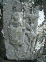 Carving of St. Francis in the cup of a flower preaching to birds on a tree, Creevelea friary, Co. Leitrim
